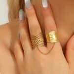 Leaf stainless Steel Adjustable Rings with a delicate center chain detail.